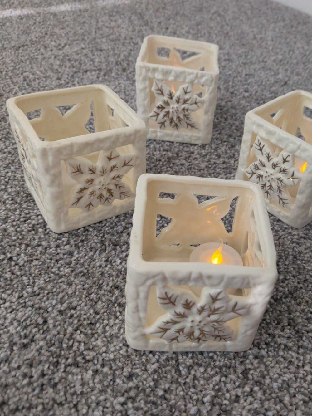 Set of 4 Cream Ceramic Pierced Poinsettia Tea Light Lanterns + 4 LED Candles